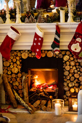 Obraz premium Christmas stockings hanging by the chimney