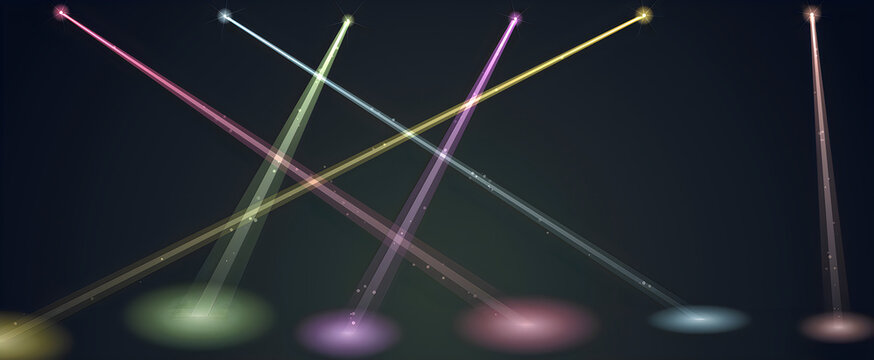 Colorful laser lights crossing in dark night sky