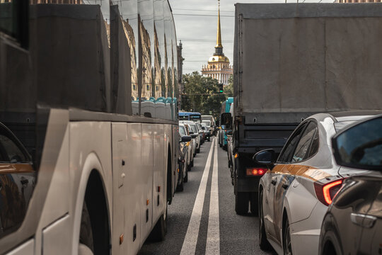 It's a typical day in the city. Many cars are stuck in a traffic jam in the city center.