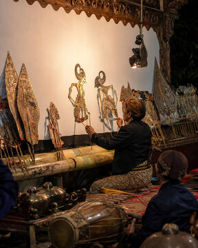 Traditional Wayang Kulit Performance with Dalang in Central Java, Indonesia