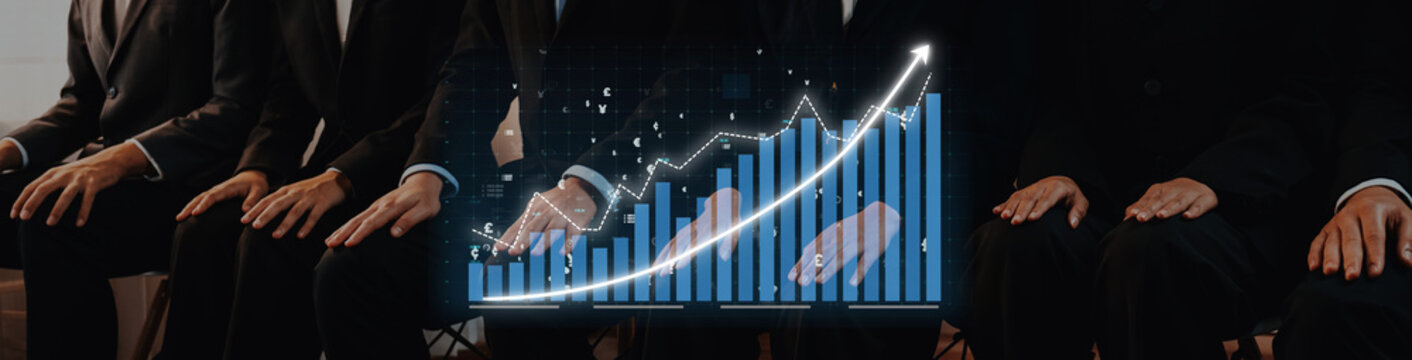 A group of business professionals is seated together, symbolizing teamwork and ambition. A digital growth chart overlays the image, indicating financial success and strategic planning. Axiom
