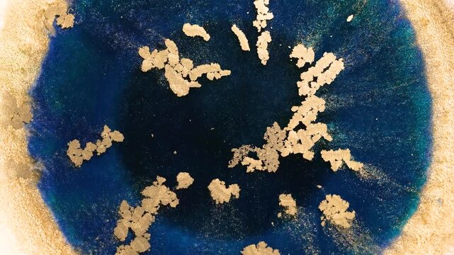 Mixing alcohol ink creates colorful abstract patterns