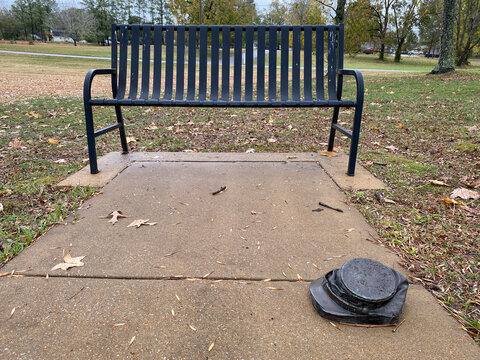 Corinth, Mississippi: Corinth Civil War Interpretive Center. Bronzed soldier's Kepi or Forage Cap among "Detritus of War" along path to visitor center entrance. 