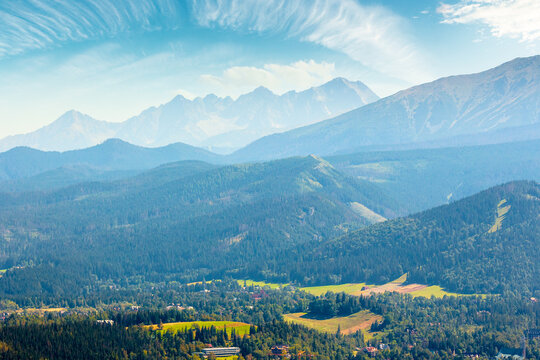 mountain landscape of Poland in late summertime. wonderful view of High Tatra ridge above Zakopane village valley. vacation place in Europe