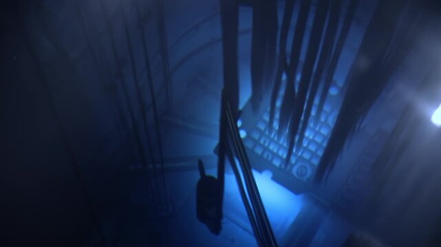 Nuclear Research reactor core powered with blue glow, radiation power plant.