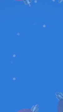 Animation of snow falling over christmas bauble decorations on blue background