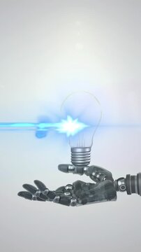 Animation of illuminated light bulb over hand of robot arm, with moving light on grey background