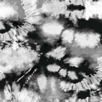 Monochrome tie dye seamless pattern with dark black and white swirling clouds and ink wash effect