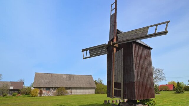 Old wooden windmill standing in rural Vormsi, Estonia