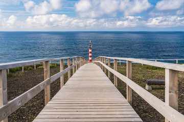 Fototapeta premium Lighthouse on scenic coast of Sao Miguel Island Azores archipelago