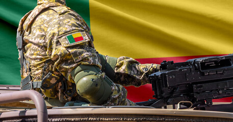 Benin flag with soldier at machinegun turret © lucky pics