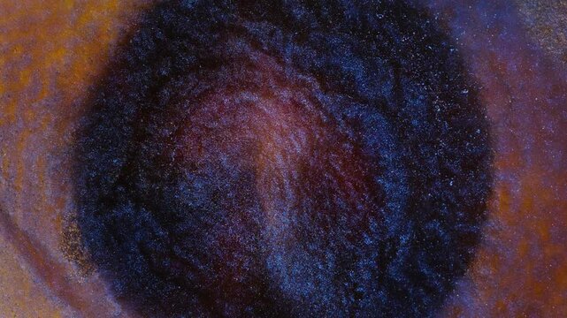 Mixing alcohol ink in a circle on a flat surface