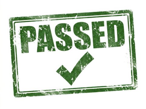 Green passed rubber stamp with a check mark icon for quality control approval