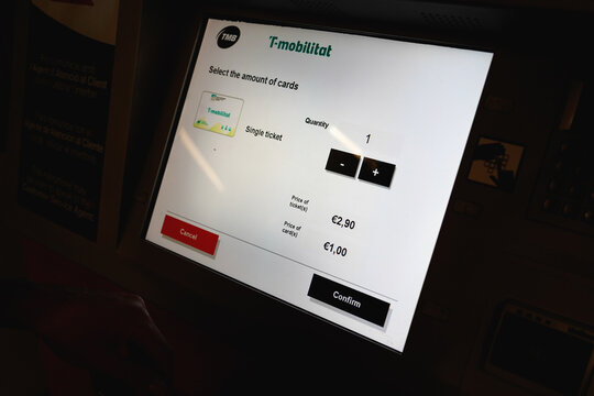 BARCELONA, SPAIN - AUGUST 23, 2026: Ticket vending machine screen showing ticket selection and prices for T-mobilitat sy