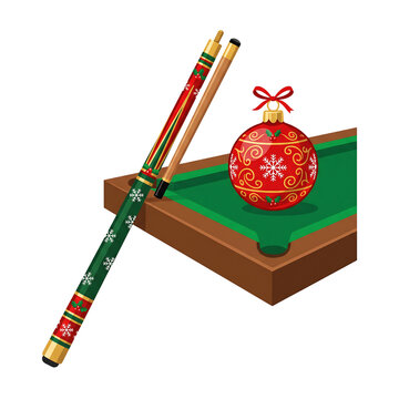 Christmas billiards cue and red ornament on pool table isolated on white background
