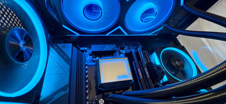 Minsk, Belarus. Jul 15, 2026. Gaming PC interior with blue RGB fans, liquid cooler and RGB memory modules