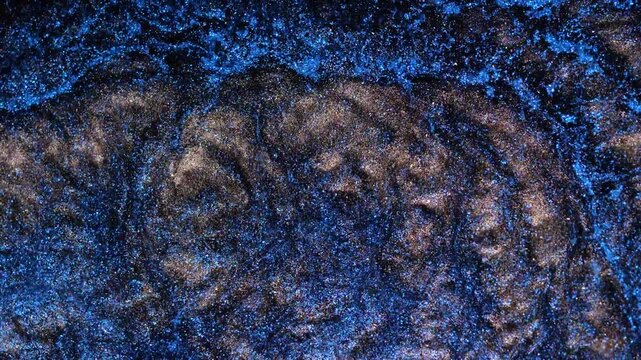 Mixing alcohol ink fragments in macro view within a creative workspace