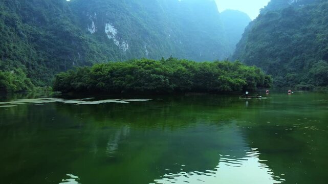 4K Drone View of Trang An Emerald Waterways and Karst Mountains in Ninh Binh, Vietnam