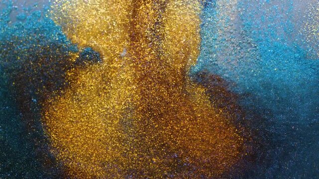 Mixing alcohol ink creating unique textures in warm brown shades