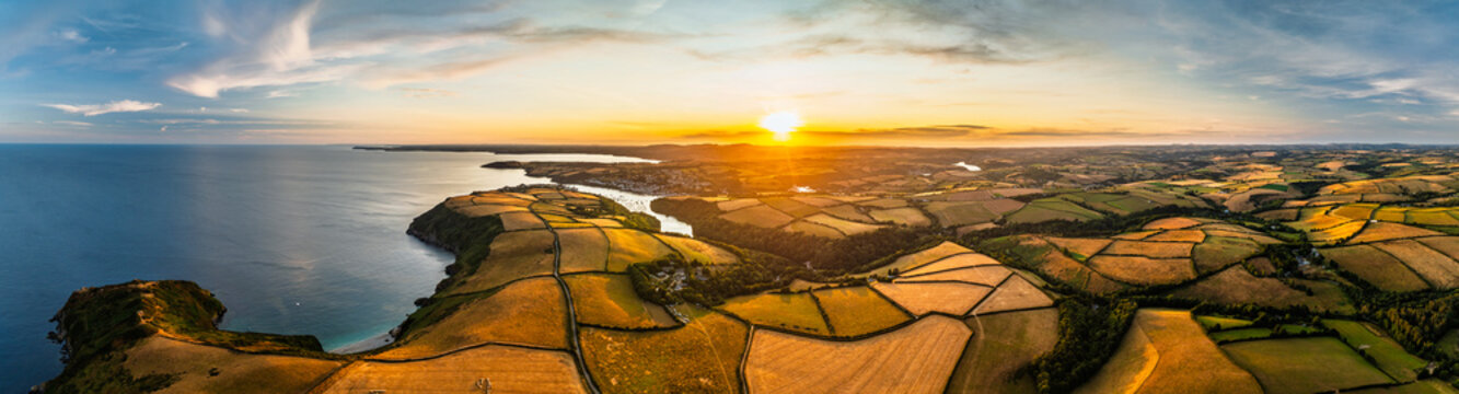 Sunset over Cornwall Fields and Farms from a drone, Polruan, Cornwall, England