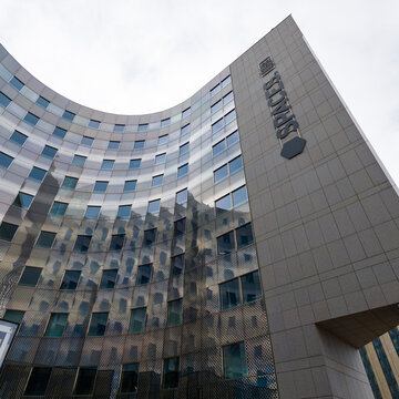 PARIS, FRANCE - SEPTEMBER 1, 2026 - Spaces modern office building featuring a curved metal facade and reflecting windows
