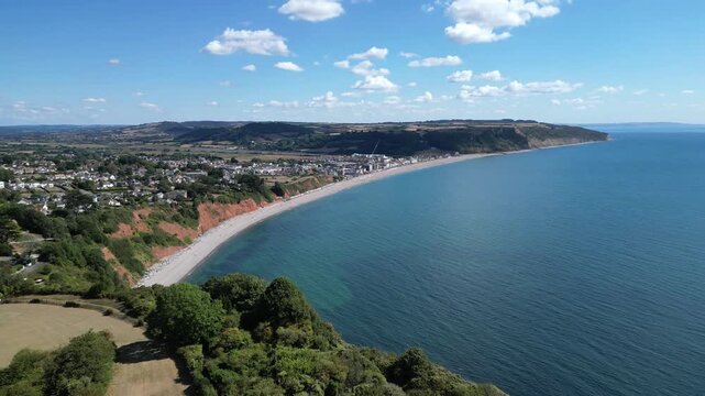 Seaton, Devon, England: DRONE VIEWS: 1. The town of Seaton and Seaton beach; 2. The River Axe valley and hills in the background; 3. The Jurassic Coast UNESCO World Heritage Site coastline.