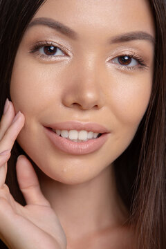 Close up beauty portrait with healthy glowing skin and smile