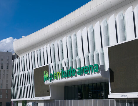 PARIS, FRANCE - SEPTEMBER 1, 2026 - Plenitude Arena exterior in La Defense district under blue sky