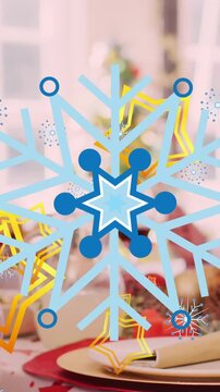 Animated video of a family in Santa hats enjoying a starry Christmas dinner.