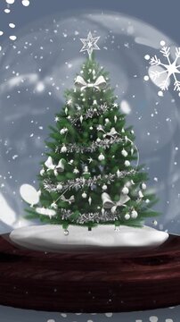 Animation of snow globe with christmas tree over snow falling and fir trees