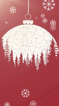 Animation of dangling christmas bauble with snow falling