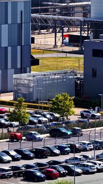 Aerial view of the Google GRQ Eemshaven industrial campus above parked cars.