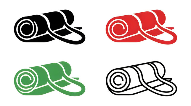 Four rolled yoga mats in different colors