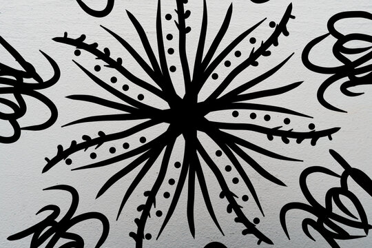 Hand drawn floral starburst botanical mandala line art illustration isolated on white background