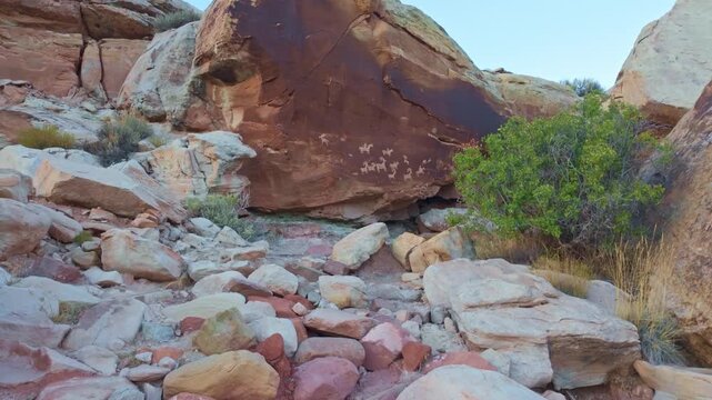Ancient petroglyph carvings mark the rock along the Delicate Arch trail in Arches National Park