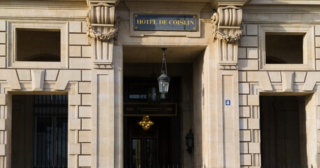 Obraz premium PARIS, FRANCE - SEPTEMBER 1, 2026 - Hotel de Coislin building facade showing entrance, sign, and neoclassical architecture details