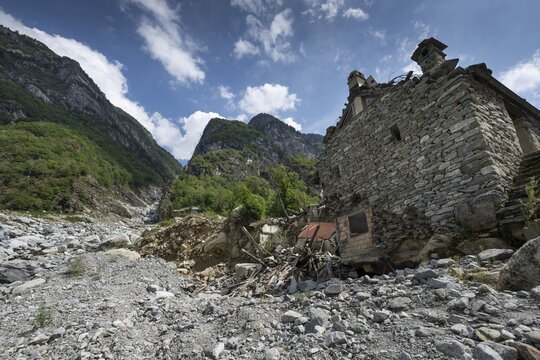 Devastation of a house due to debris and boulders, as a result of heavy rock and debris flow on the night of June 29-30, 2024 following heavy rains, Fontana, Bavona Valley or Val Bavona, Maggia Valley, Tessin, Switzerland