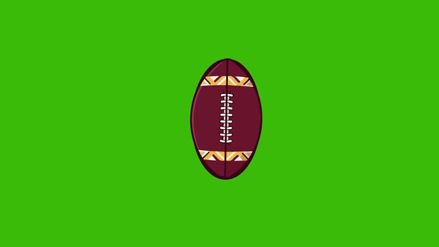Patterned american football spinning and bouncing isolated on green screen background