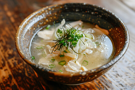 Indonesian soto ayam, chicken soto with clear soup and chicken broth
