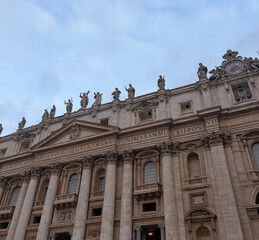Fototapeta premium Facade of St Peter’s Basilica with Statues and Latin Inscription Vatican Rome