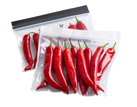 Vacuum packaging, chili peppers in glossy clear plastic packaging Isolated on Transparent or White Background