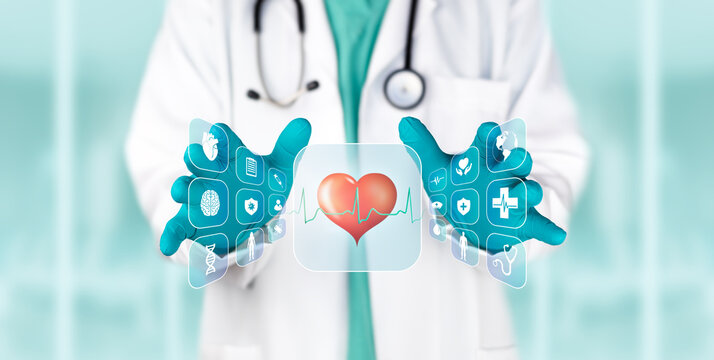 A doctor displays a heart icon on a medical interface for health assessment, data analysis, and prevention. Medical technology.