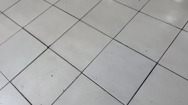 Perspective View Of Clean White Ceramic Floor Tiles Pattern Background