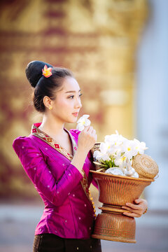 Embrace the peace and elegance of Southeast Asia. Pure joy and sacred heritage captured in one stunning moment. Ideal for warm, inviting travel banners.