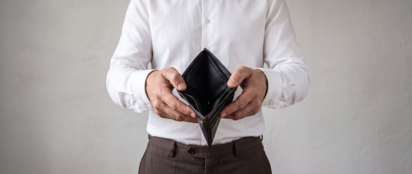 Businessman Showing Empty Wallet Financial Problems Concept