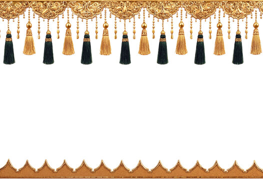 Ornate golden border with intricate patterns and hanging tassels in elegant design for decorative use