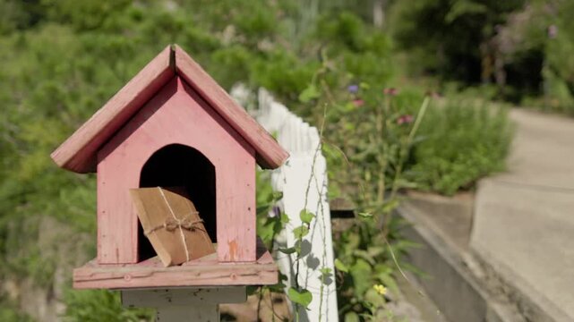 Right-to-left camera slide showing a vintage mailbox and envelope