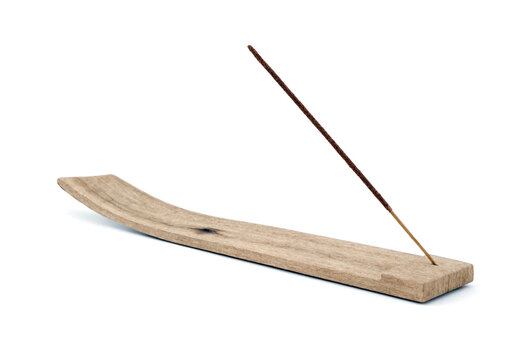Wooden incense stick holder with burning incense isolated on transparent background for meditation and relaxation