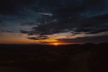sunrise with cloudy sky in the moutains