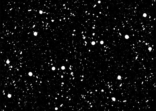 An abstract winter composition on a black background. White spots and dots resemble snowflakes falling chaotically across the night sky. The contrast of black and white creates a frosty winter atmosph